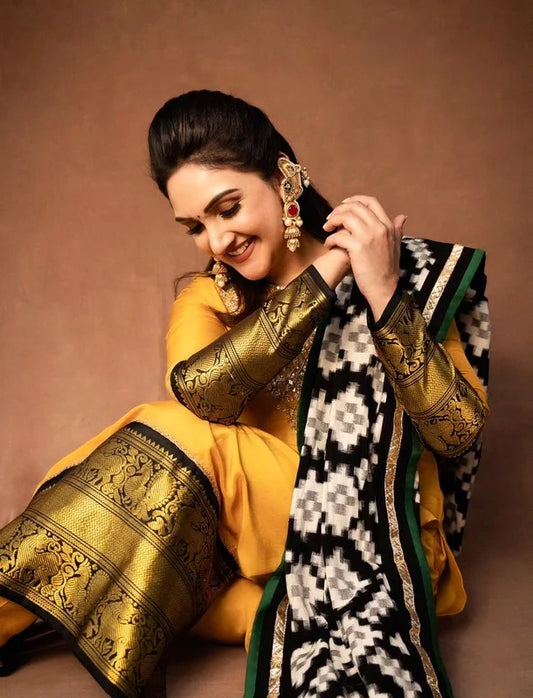 Sridevi Vijaykumar in Double Ikkat detailed Kanchi Suit Set